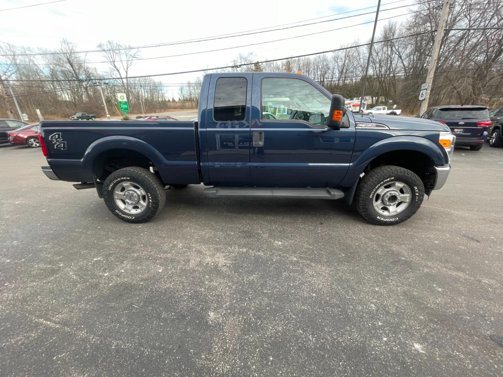 2015 Blue /Gray Ford F-350 SD XLT SuperCab Long Bed 4WD (1FT8X3B68FE) with an 6.2L V8 OHV 16V engine, 6-Speed Automatic transmission, located at 11115 Chardon Rd. , Chardon, OH, 44024, (440) 214-9705, 41.580246, -81.241943 - This 2015 Ford F-350 XLT Supercab 4WD, equipped with a robust 6.2L V8 engine and a 6-speed automatic transmission, offers substantial power and capability, suited for both work and recreational towing needs. It ensures driver comfort with a power driver's seat and power-adjustable pedals, coupled wi - Photo #6